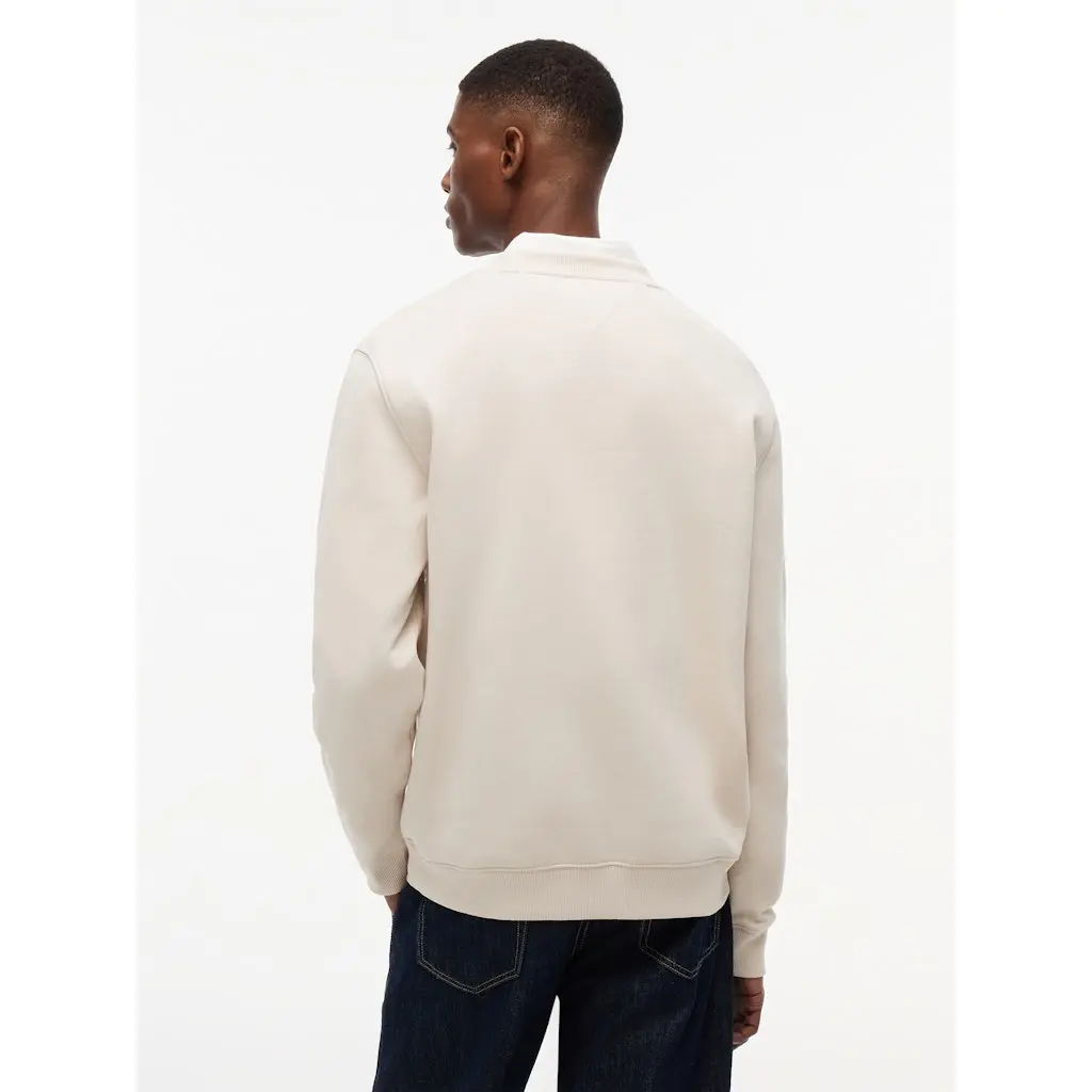 Tommy-Jeans_miesten-beige-collegepaita
