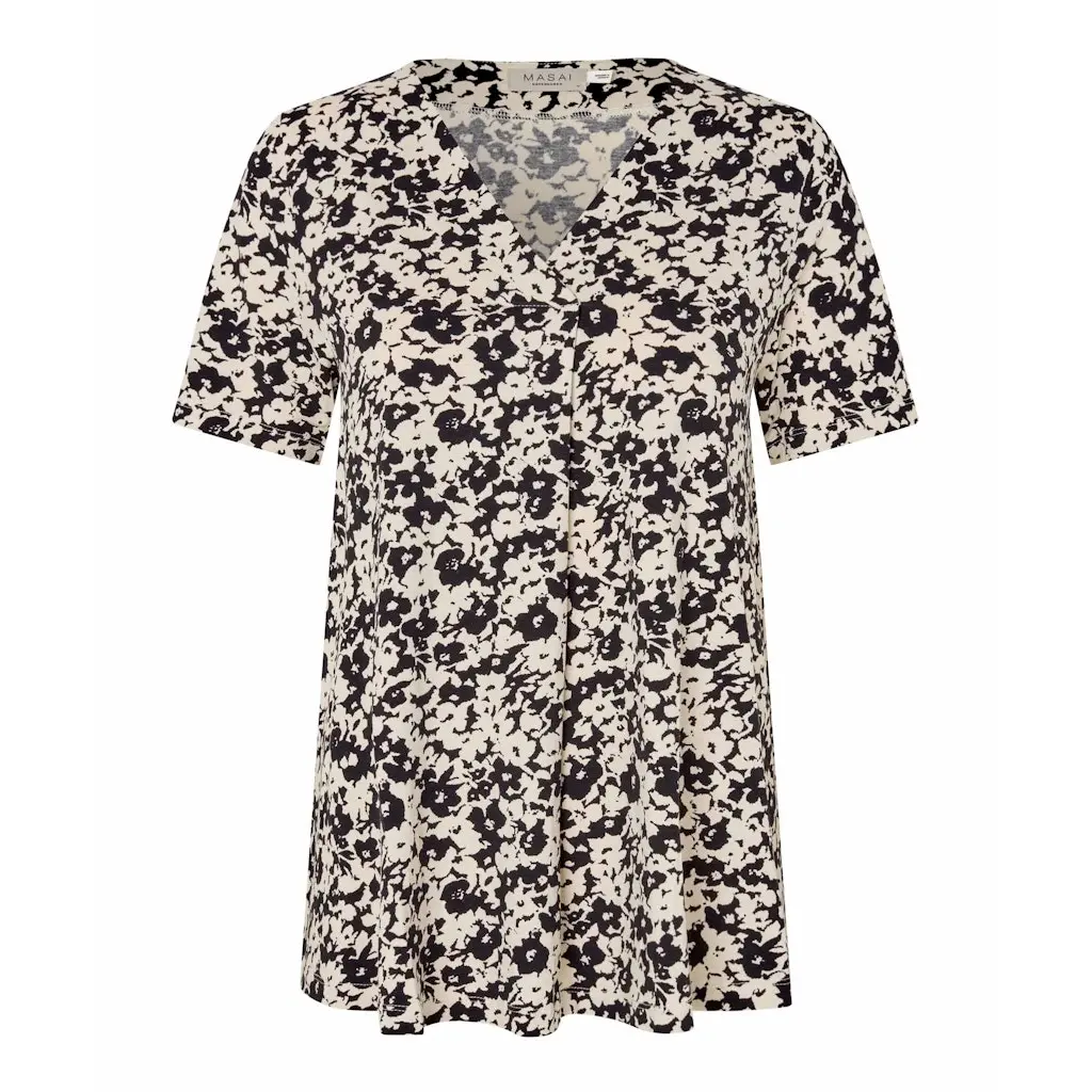 Masai_trikoinen-a-linjainen-masai-t-paita-v-paantiella-beige-mustalla-kukkakuviolla