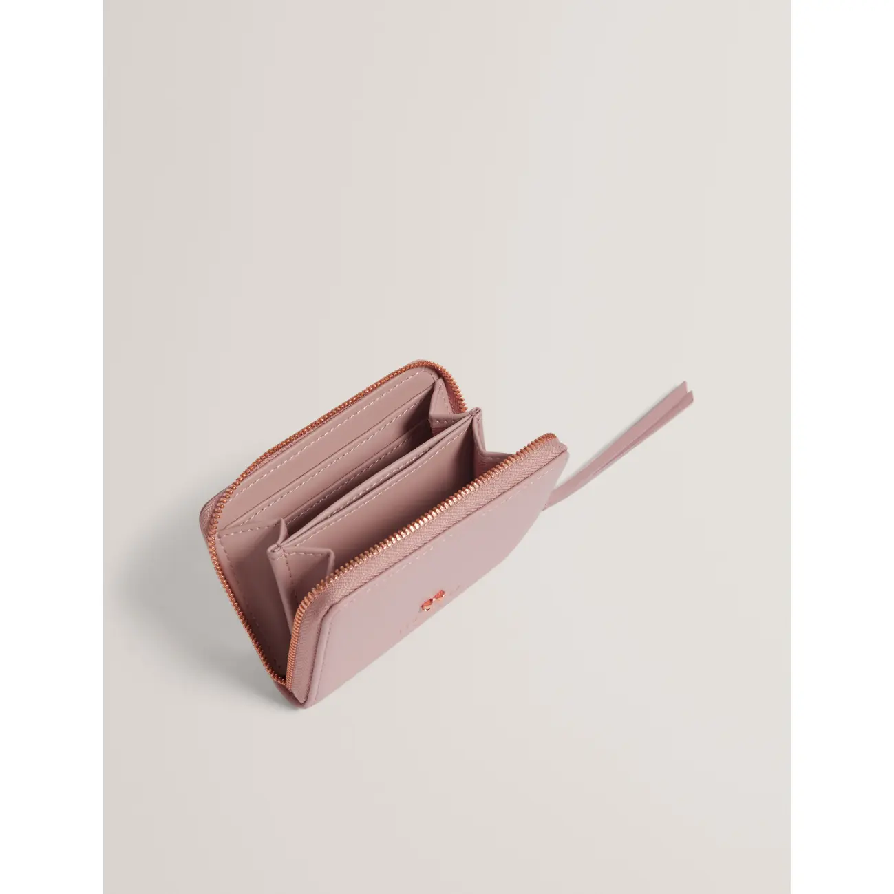 Ted-Baker-vaaleanpunainen-pieni-lompakko-rusettikoristeella